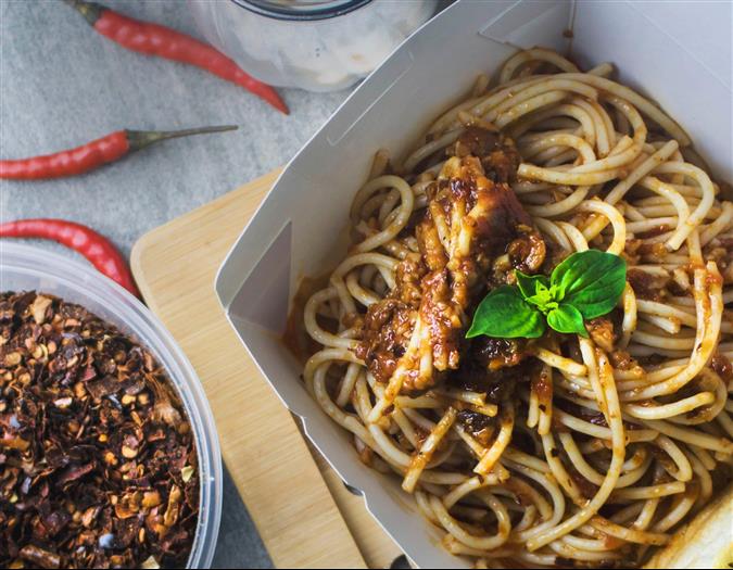 noodles in a takeout container